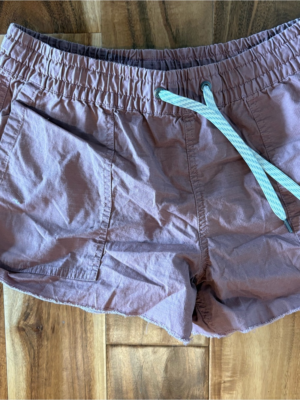 Vuori Women's Pull-On Athletic Shorts in Dusty Mauve with Light Drawcord